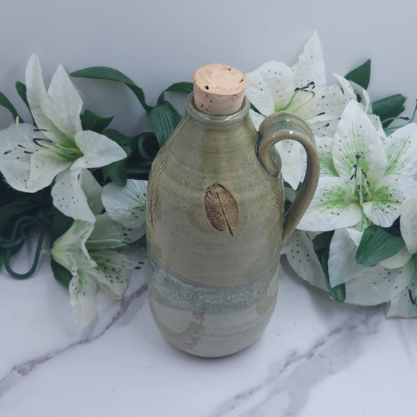 Cork lid Bottle w/leaves handmade pottery