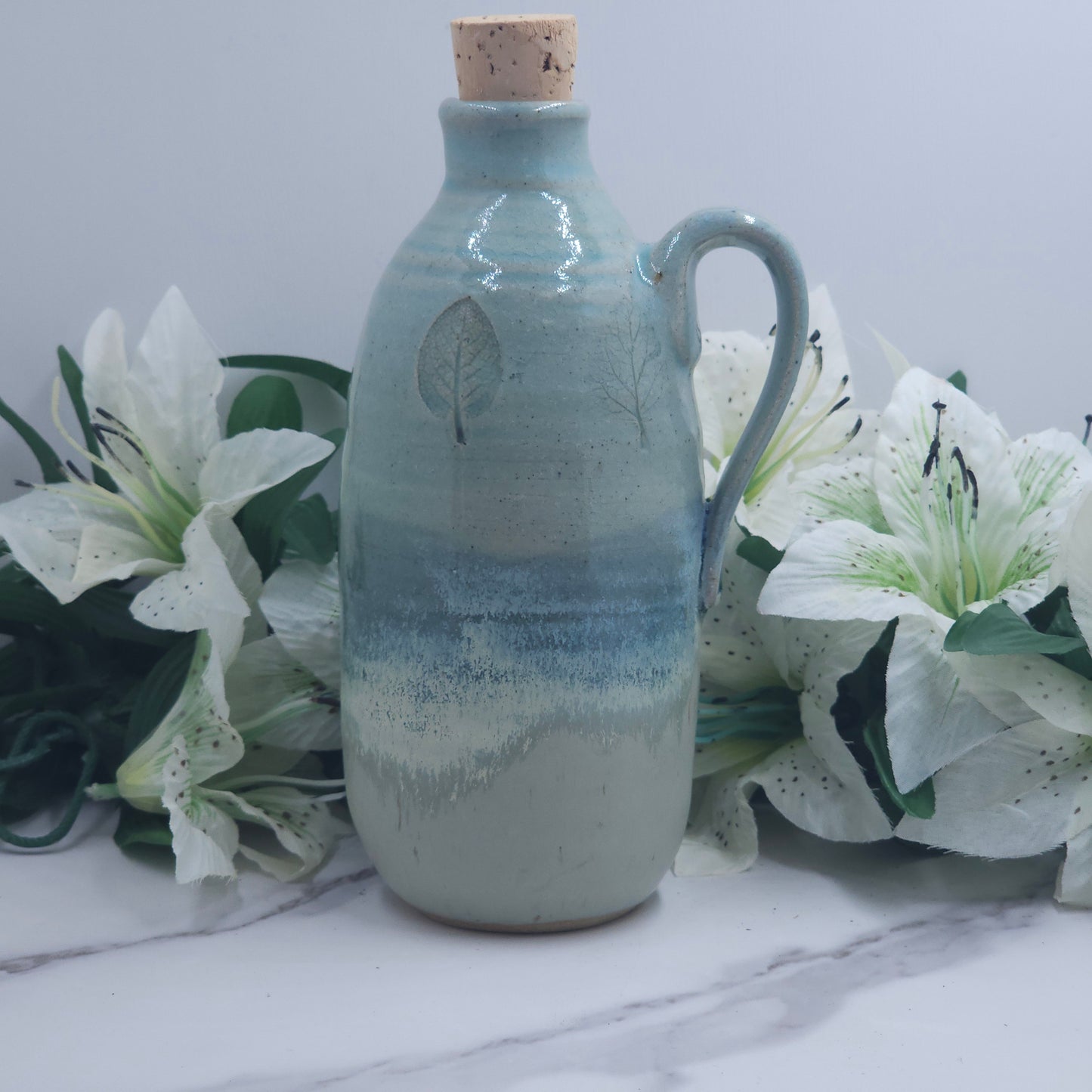 Cork lid Bottle w/leaves handmade pottery