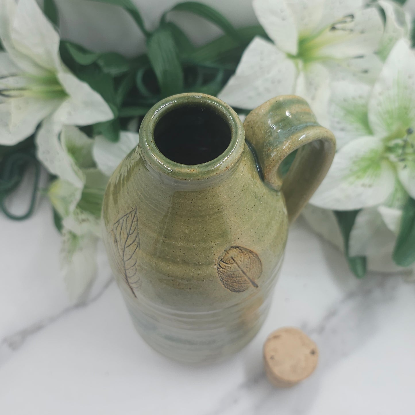 Cork lid Bottle w/leaves handmade pottery