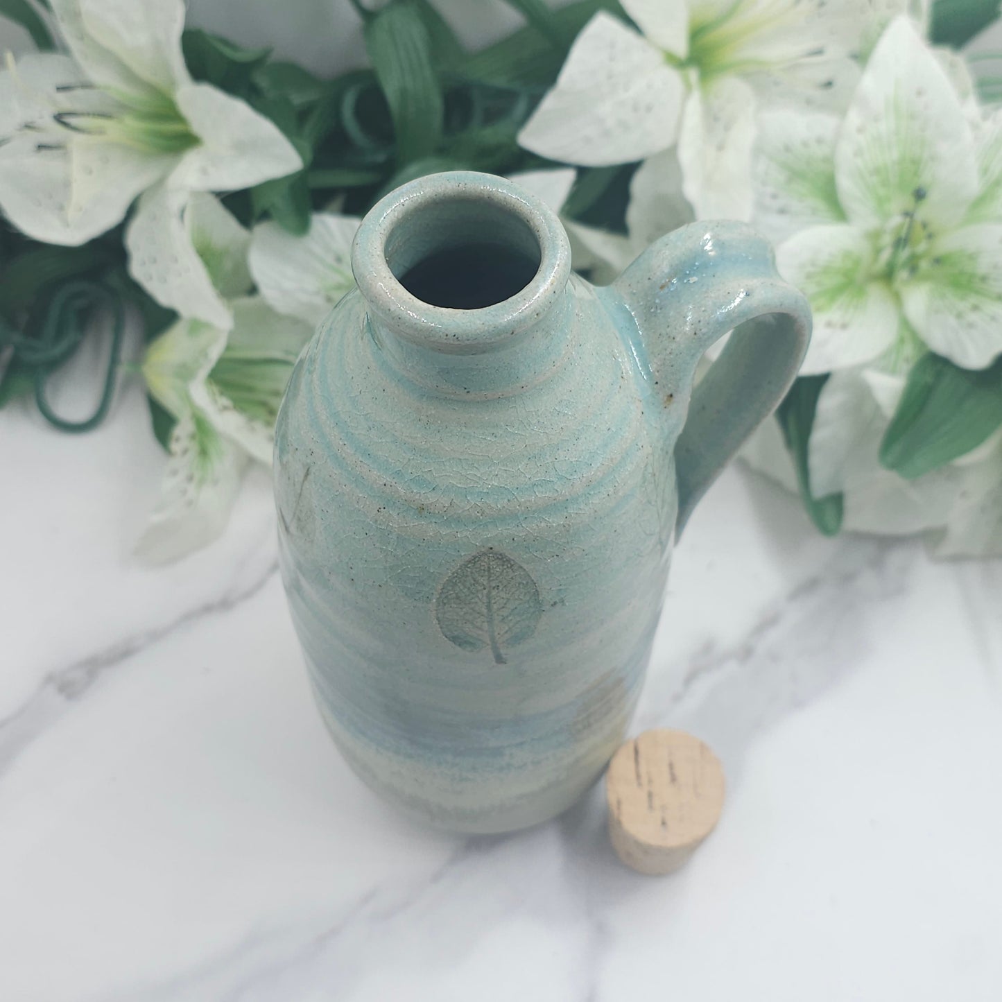 Cork lid Bottle w/leaves handmade pottery